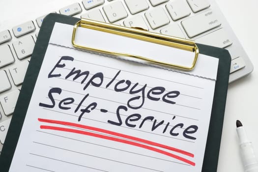 Clipboard with written mark employee self-service.