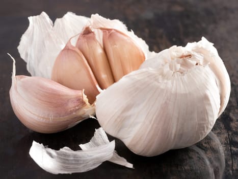 fresh organic garlic on black background. Close up