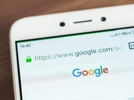 Moscow, Russia - June 03, 2019: Google logo on smartphone screen. Logo of Google company on main page of google.com site. Selective focus.