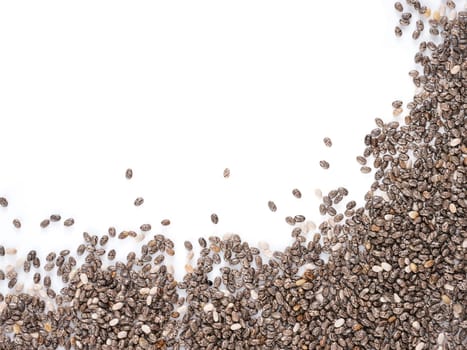 Chia seeds with copy space. Isolated one edge. Top view or flat lay. Healthy food and diet concept