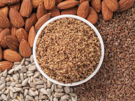 Homemade LSA mix in plate - Linseed or flax seeds, Sunflower seeds and Almonds. Traditional Australian blend of ground, source of dietary fiber, protein, omega fatty acids.Copy space for text.Top view