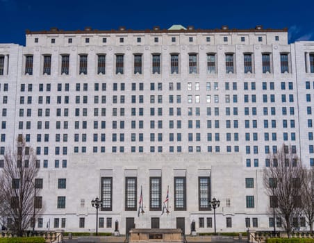 White marble entrance and facade to the Supreme Court of Ohio in Columbus with US flag flying