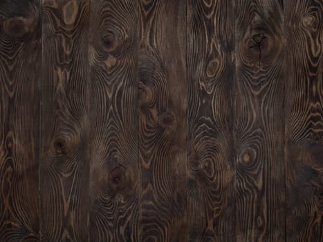 Wood background. Dark wooden texture empty surface. Copy space for text and design. Dark brown larch rustic wooden table top. vertical stripes of boards