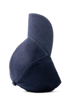 A navy blue baseball cap is positioned against a stark white background, showcasing its shape and design. The caps brim is curved, and the fabric appears to be a smooth, durable material, ideal for casual wear or outdoor activities.