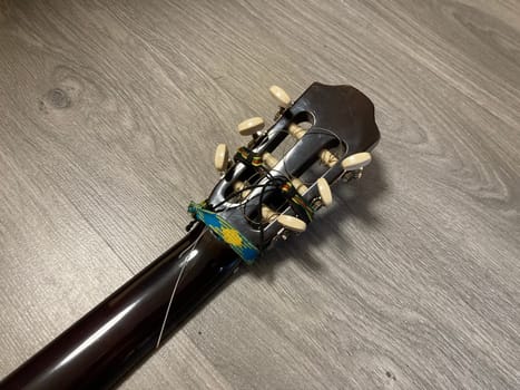 Acoustic guitar and its elements for the playing