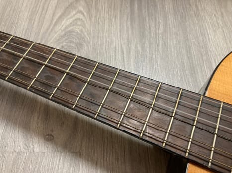 Acoustic guitar and its elements for the playing