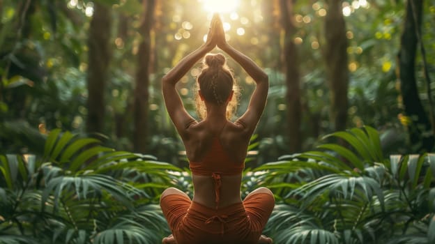 One girl, practicing yoga in the sunlight, performs Padmasana exercises, the lotus position.