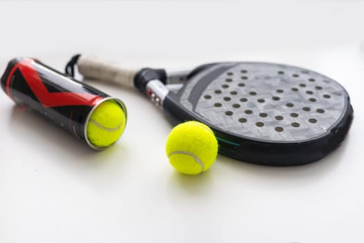 blue professional paddle tennis racket isolated on white background. portrait sport theme poster, greeting cards, headers, website and app. High quality photo
