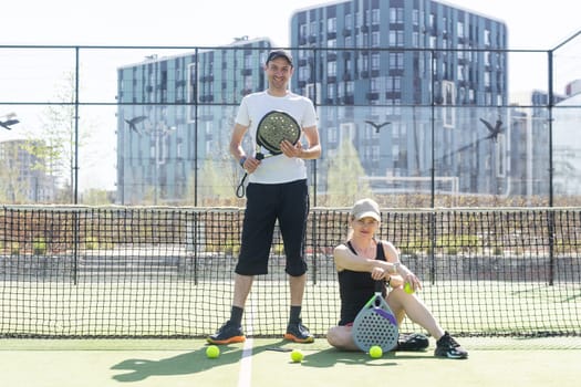 paddle tennis couple players ready for class. High quality photo