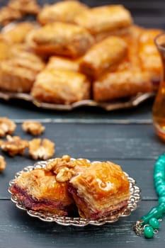 Plate of baklava dessert close up served on table