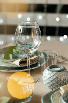 Empty wine glass on a restaurant table