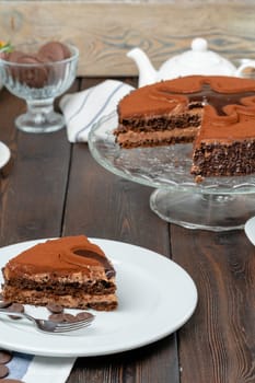 Chocolate cake with chocolate powder on top