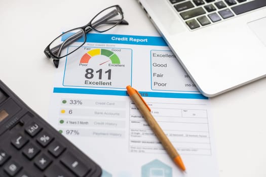 Credit report with score on a desk. High quality photo