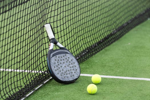 Paddle tennis racket and ball. High quality photo