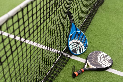 Paddle tennis racket and ball. High quality photo