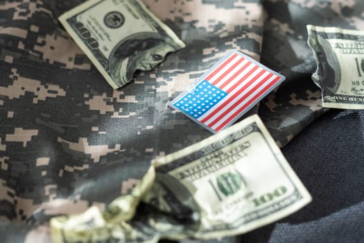 Stack of money on American Flag. dollars. High quality photo