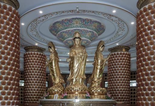 Bangkok, Thailand - Apr 11, 2024 - Golden statue goddess of Mercy Guanyin or Quan Yin statue at Fo Guang Shan Thaihua Temple. Guan Yin Buddha, Taiwanese temple style, Space for text, Selective focus.