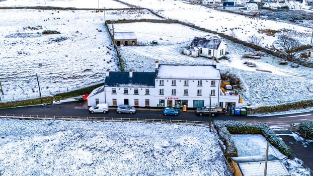 PORTNOO, COUNTY DONEGAL, IRELAND - JANUARY 17 2023 : The shop is located close to the harbour.