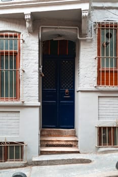 Old wooden entrance door of house in Istanbul, Turkey