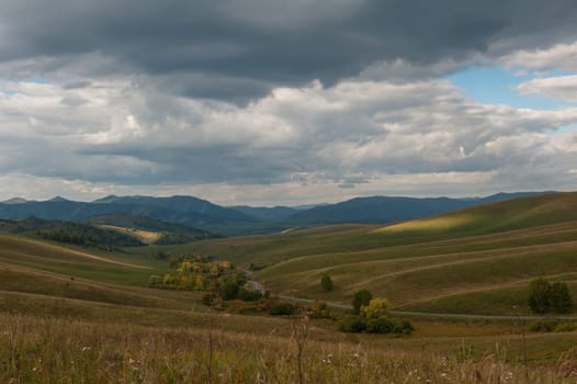 Autumn road in Altai mountains