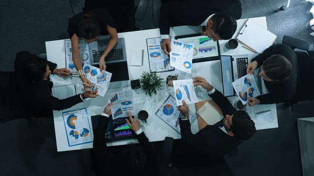 Time lapse of diverse marketing team prepare for business meeting. Top down aerial view of businesspeople placed laptop and tablet with financial statistic at table. Creative business. Directorate.