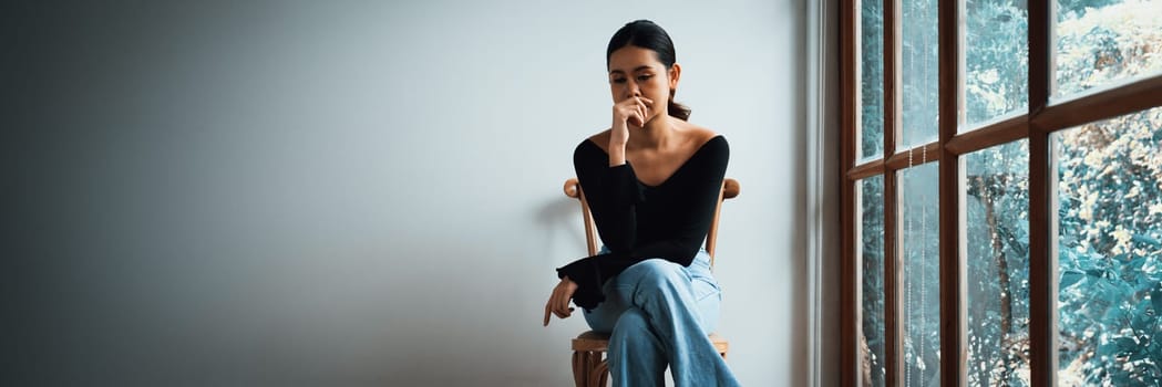 Depressed young Asian woman with mental health problem in mind need uttermost treatment from overthinking fatigue, disruptive thought, dissocial, anxiety and other mental health disorders .