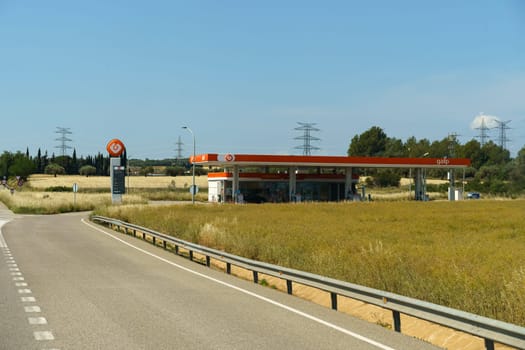 Barcelona, Spain - May 24, 2023:A gas station Galp situated on the roadside, serving passing vehicles with fuel and convenience store goods.