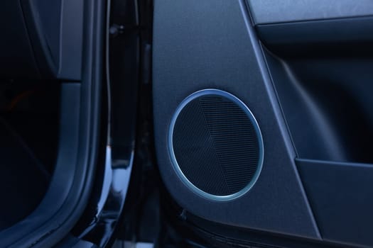 car audio system close up. car audio, car speakers, subwoofer and accessories for tuning. Dark background.