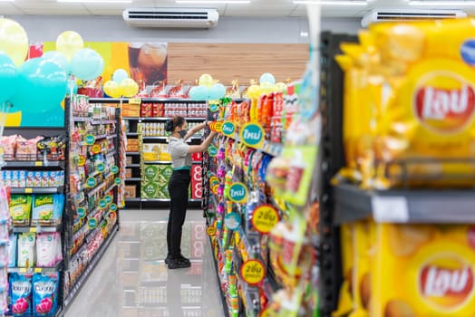 Bangkok, Thailand - November 23, 2021 : Unidentified supermarket or hypermarket is a popular destination for shopping a food and relaxing family.