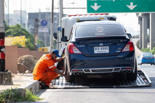 Bangkok, Thailand - November 22, 2022 : Car damaged crash from car accident on the road wait insurance in a city collision in Bangkok Road, accidents are a major problem of traffic in Thailand.