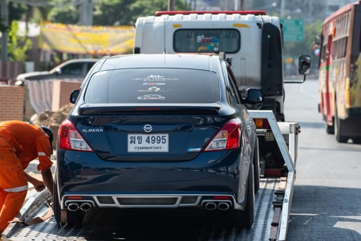 Bangkok, Thailand - November 22, 2022 : Car damaged crash from car accident on the road wait insurance in a city collision in Bangkok Road, accidents are a major problem of traffic in Thailand.