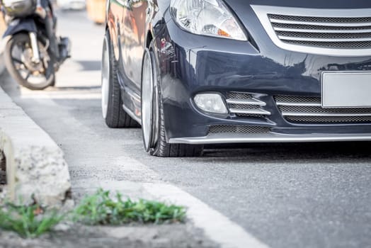 Car damaged crash from car accident on the road wait insurance in a city collision in Bangkok Road, accidents are a major problem of traffic in Thailand.