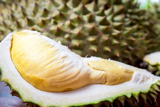 Durian is a king of fruit in Thailand and asia fruit have a spikes shell and sweet can buy at Thai street food and fruit market at agriculture farm