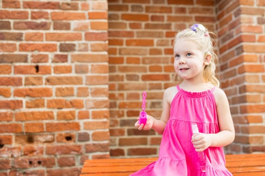 Child walks with cochlear implant system. Installation cochlear implant on child girl ear for restores hearing. Kid hears after hear return to normal. Diversity inclusion