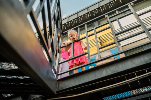 Summer portrait of happy cute child girl. Emotions and childhood