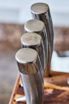 Close-up of brushed metal Knife Handles in Fort Wayne, Indiana showcasing modern design, safety, and durability.