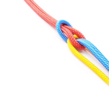 Colorful, ropes and knot for pride together in studio in mockup space for unity, connect and trust. Secure, string and reef for security to stop movement of objects on isolated white background.
