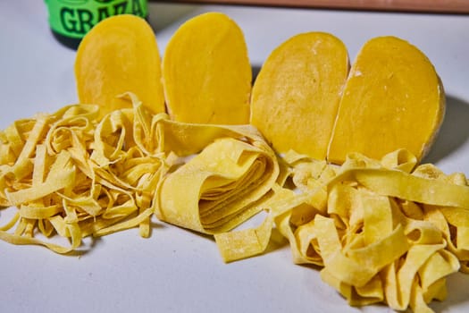 Fresh, homemade pasta showcasing Italian culinary tradition on a kitchen table in Fort Wayne, Indiana, USA