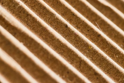 Macro view of corrugated cardboard showcasing intricate texture and eco-friendly packaging in Fort Wayne, Indiana.