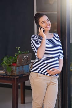 Pregnant, woman and smile with phone call in home for maternity planning, contact and consulting. Happy, person and technology with communication for pregnancy update, discussion and conversation.
