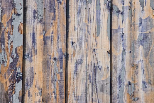 Vintage Rustic Charm: Close-up of Weathered Blue-Painted Fence in Spiceland, Indiana exhibiting the Beauty of Natural Aging and Decay