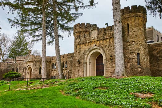 Springtime at the historic Bishop Simon Brute College in Indianapolis, Indiana, showcasing its medieval inspired architecture and serene gardens.