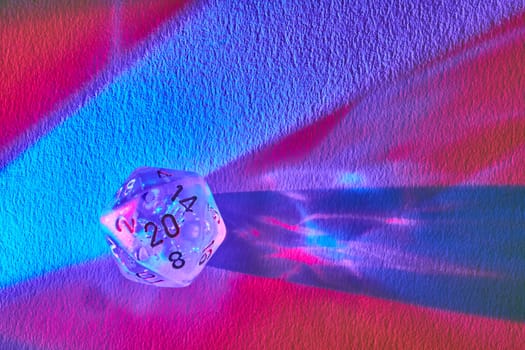 Vibrant macro shot of a translucent D20 die, evoking mystery and chance in a rainbow of lights, Fort Wayne, Indiana.