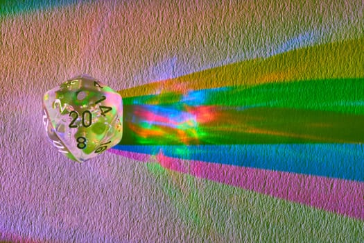 Critical Roll! Close-up of a Transparent 20-sided Die Displaying a Lucky 20, Casting a Spectacular Rainbow in Fort Wayne, Indiana.