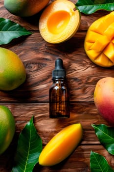 mango essential oil in a bottle. selective focus. food.