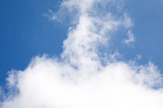 white clouds on the background of the blue sky. High quality photo