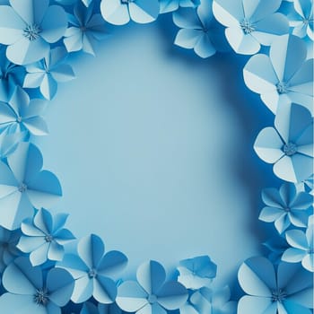 Beautiful delicate background of cut out paper blue flowers arranged around the edges of a round frame with copy space in the center, flat lay close-up.