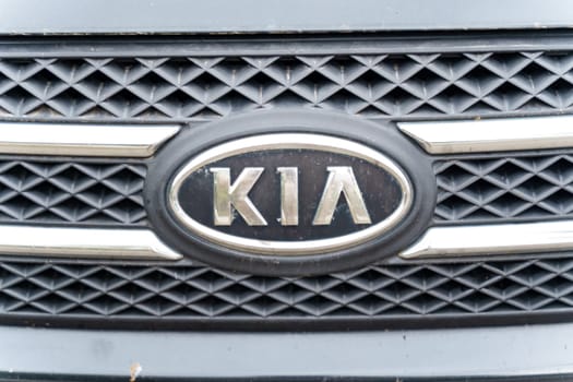 Bobruisk, Belarus - September 24, 2023: Automobile company logo - KIA on a car.