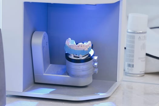 Scanning a denture in a dental laboratory to reproduce the patient's oral anatomy. Dental equipment, laboratory scanner system
