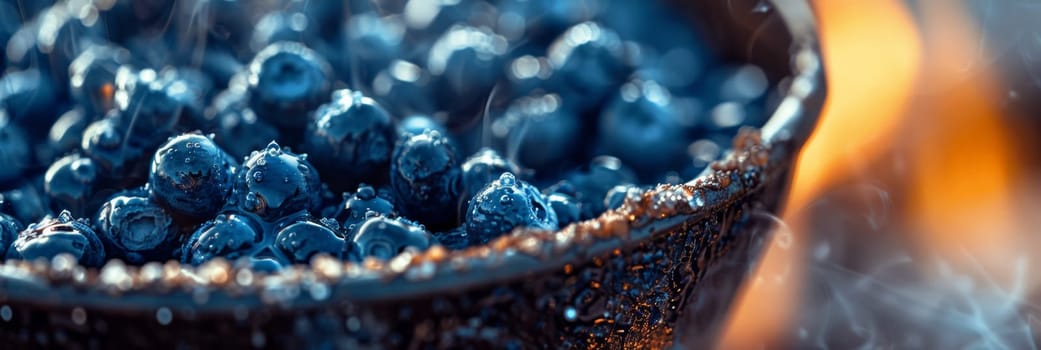 A close up of a bowl full of blueberries on fire